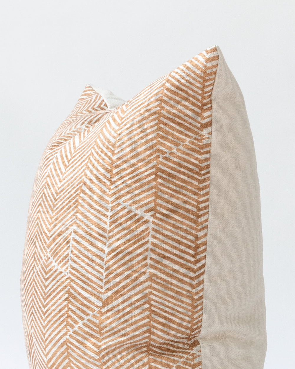 Close up detail of rust chevron pillow.