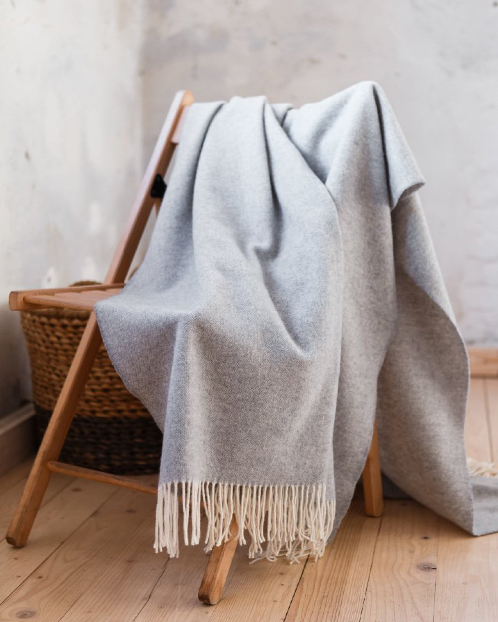 Haliburton grey wool throw with fringe from Hemme