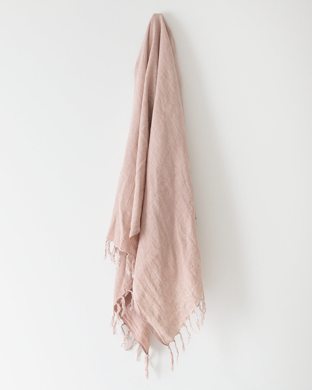 Blush Belgian linen throw with tassels