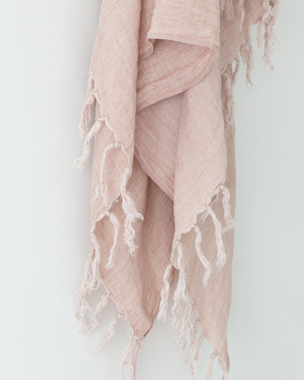 Blush Belgian linen throw with tassels