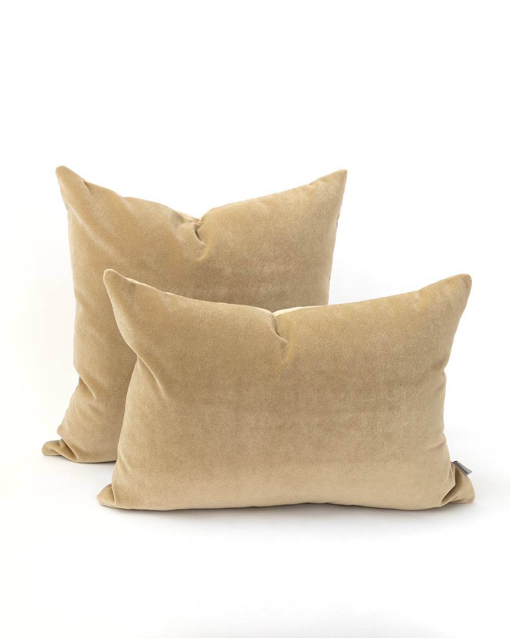 Two khaki beige velvet pillows