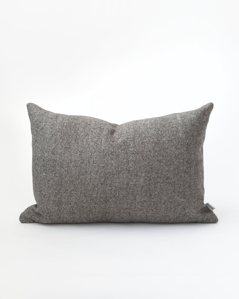 Rectangle charcoal grey pillow.