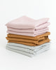 Stack of Linen tea towels in multiple colours.