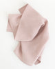 Light pink linen tea towel.