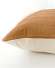 Close up detail of Dunne Quilted Cotton Pillow in black, green, pink and brown