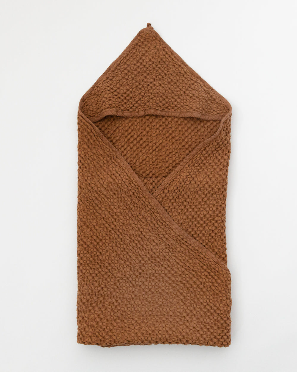 Flat folded Hooded Waffle Towel in cinnamon colour.