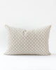 Rectangle ikat inspired dot pillow in a creamy white on a natural beige background