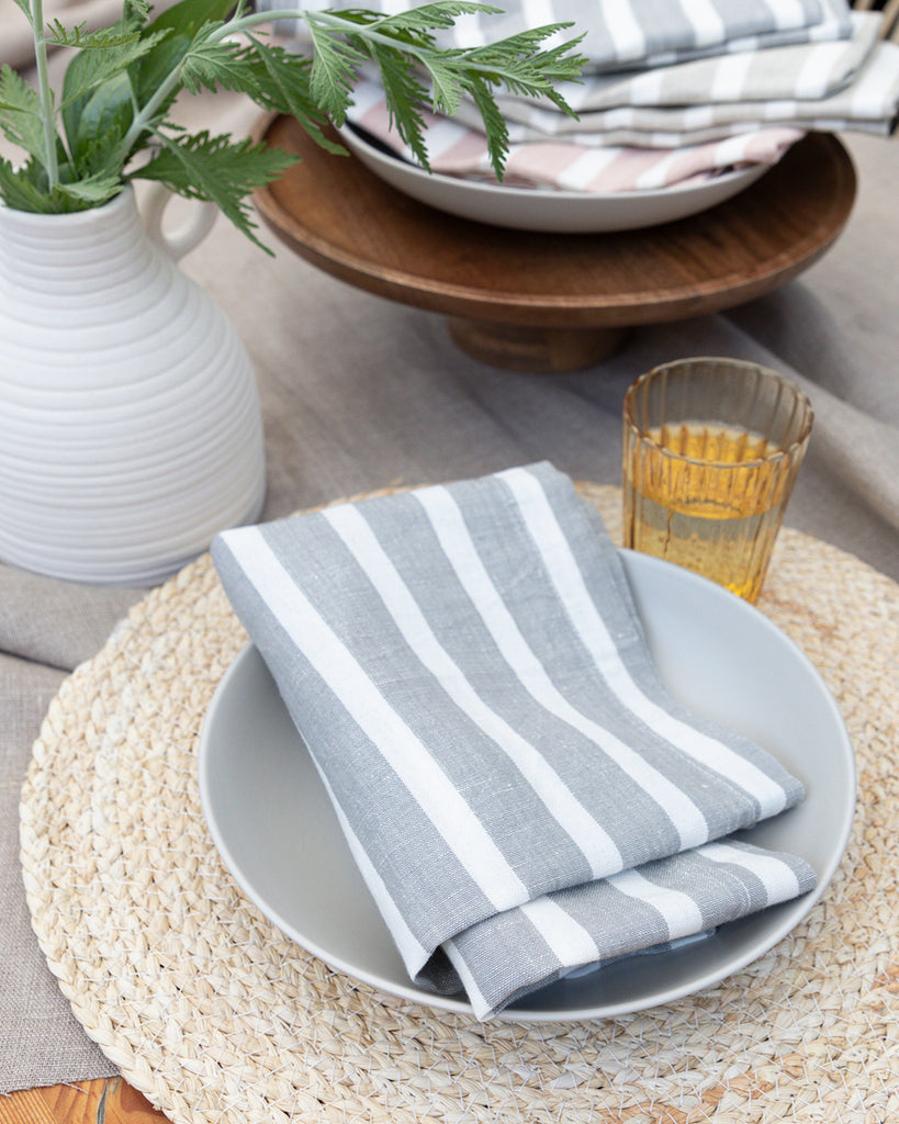 Marisol grey striped napkins sitting on table setting