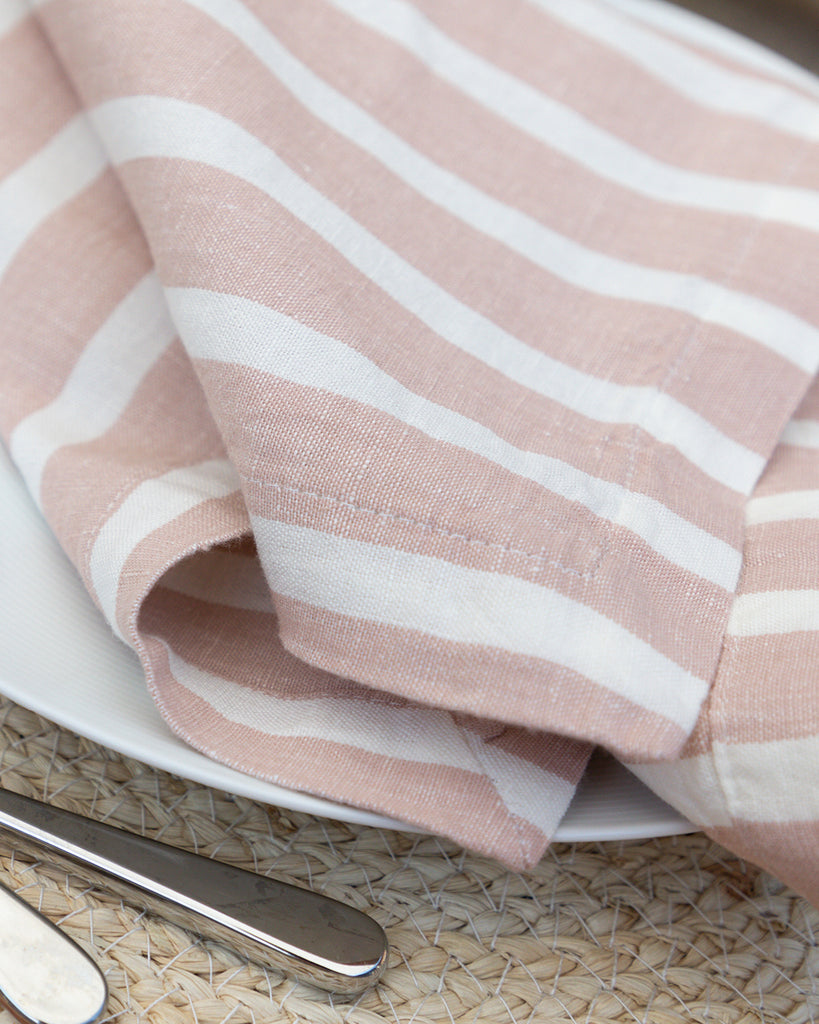 Marisol pink striped napkinMarisol pink striped napkins sitting on table setting