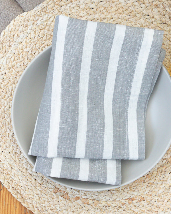 Marisol grey striped napkins sitting on table setting