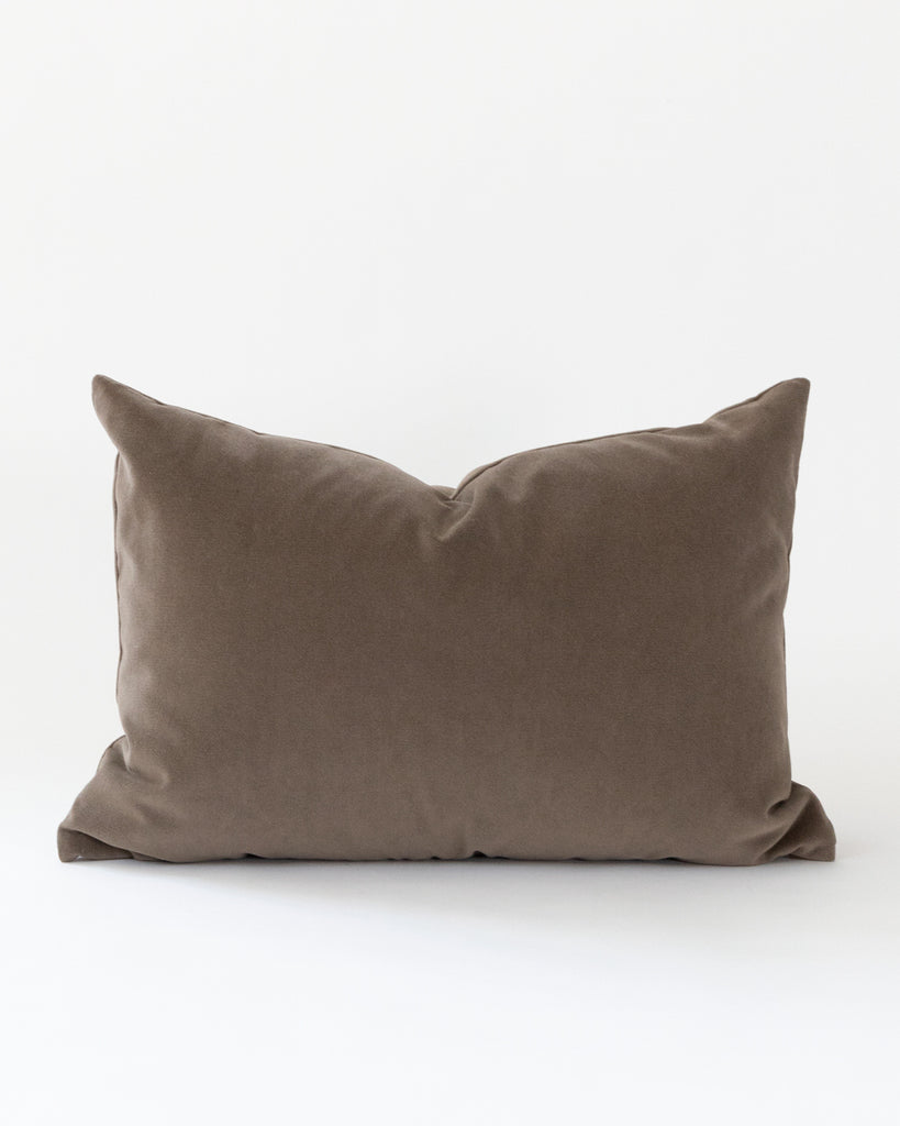 Rectangular soft brown velvet pillow with a matte look