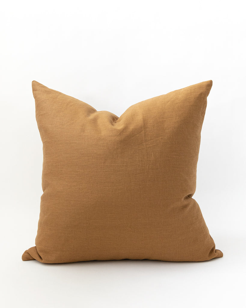 Solid linen pillow in a ginger colour