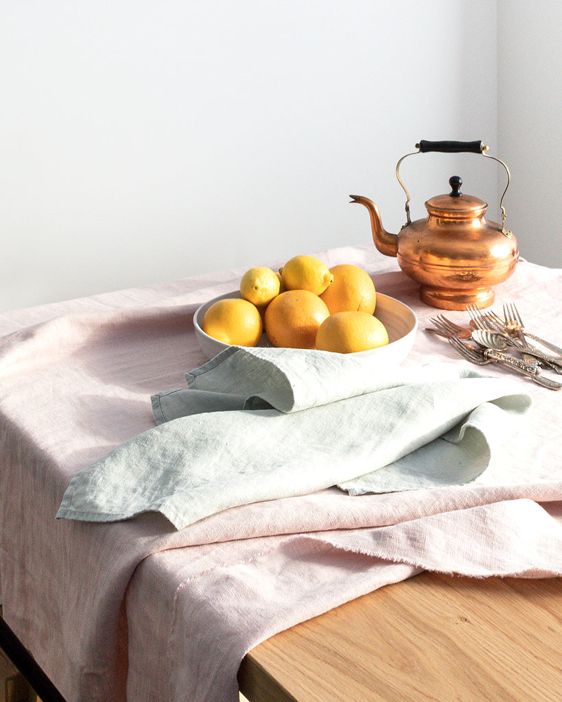 Blue stonewashed linen tea towel on table setting