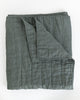 Folded dark green colour handmade Linen Quilt