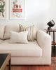 grey and white organic swirl pattern pillow on white sofa with complimentary Hemme pillow