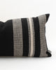 Close up detail of Black and cream striped lumbar pillow