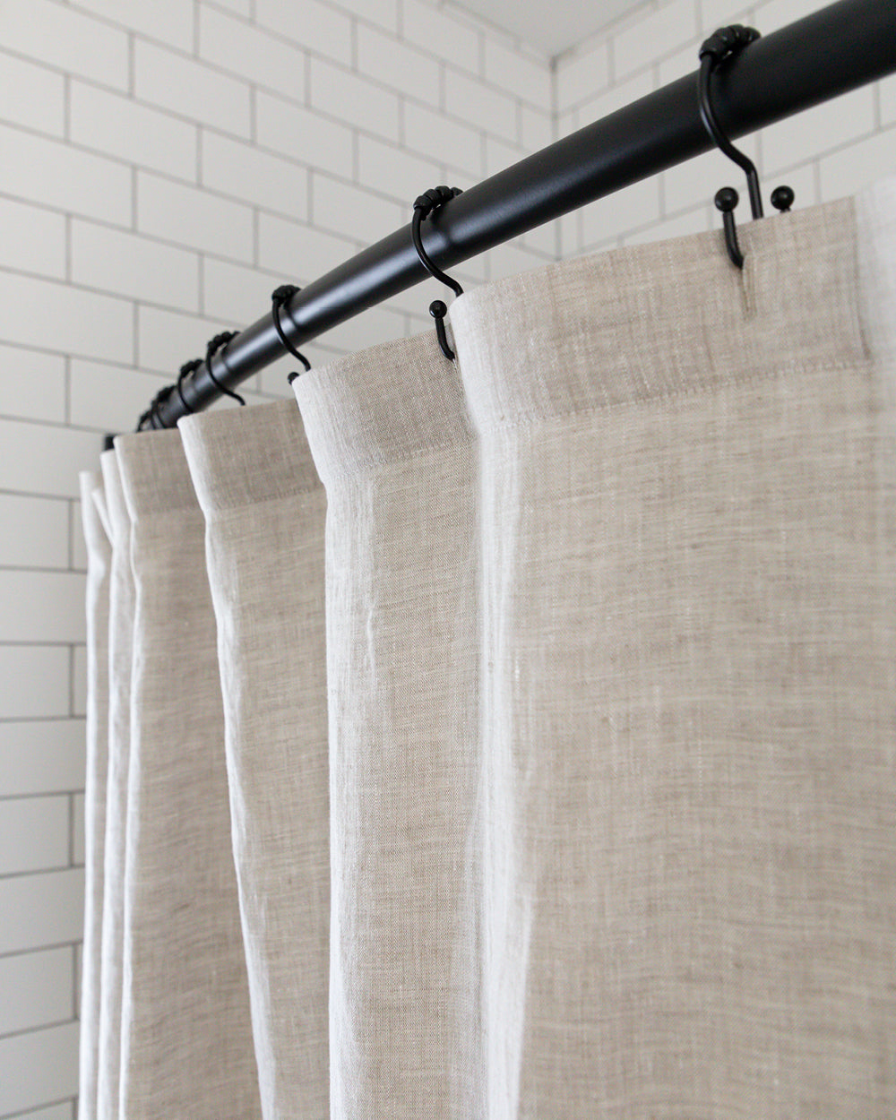Close up detail of colour-blocked linen shower curtain 