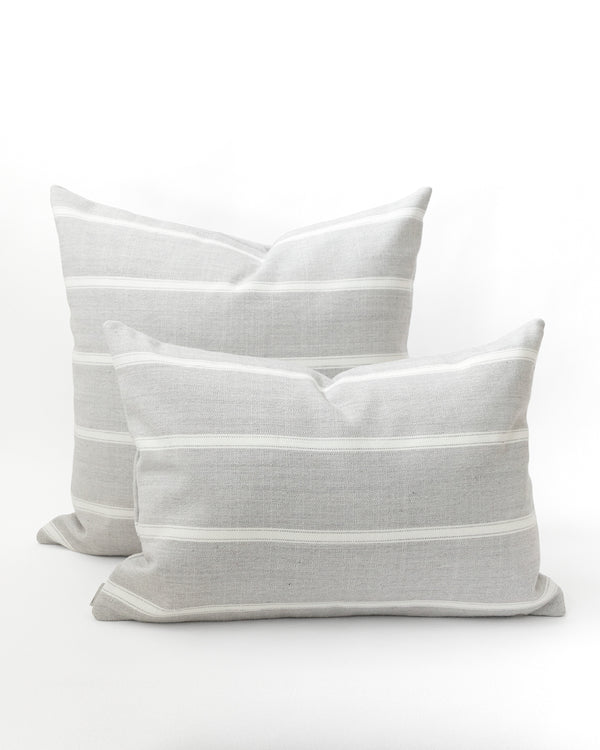 Two grey and white striped pillows