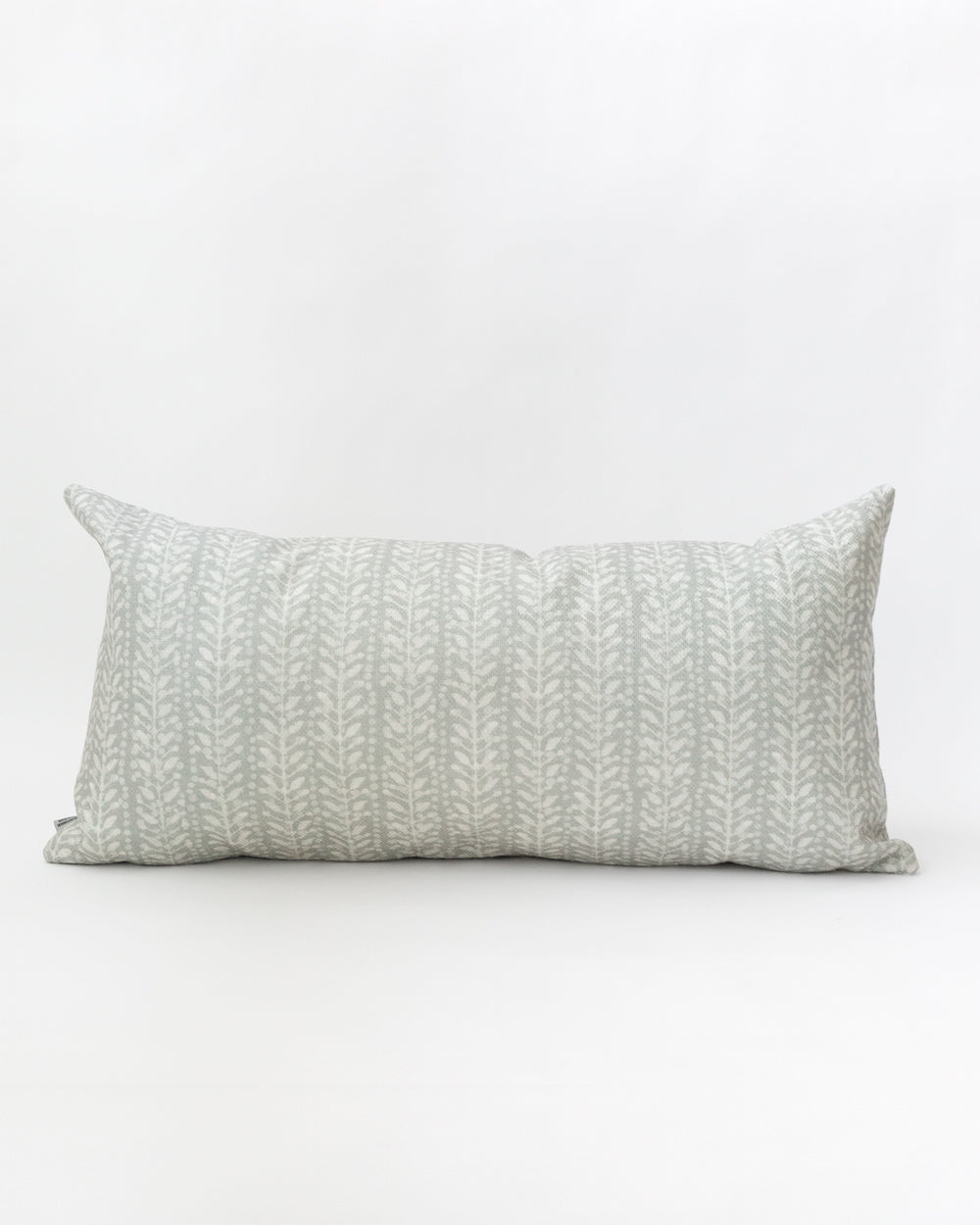 Rectangle pillow with a subtle white floral/vine stripe on a misty grey-blue background