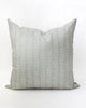 Square pillow with a subtle white floral/vine stripe on a misty grey-blue background