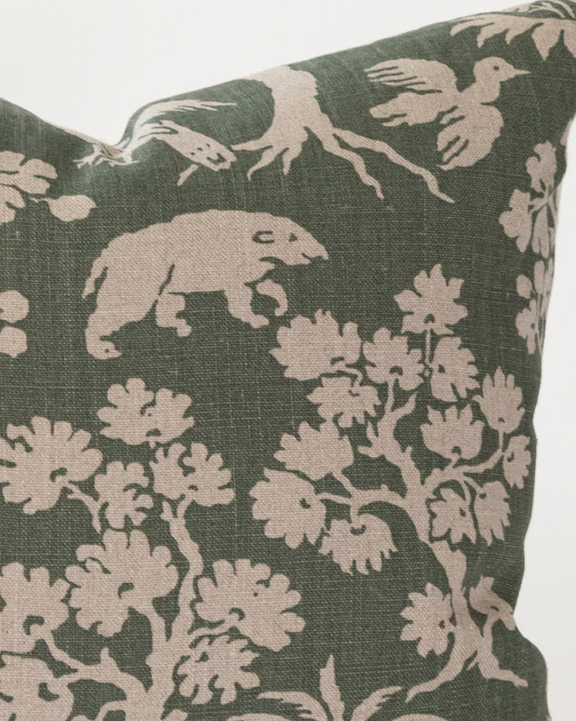 Close up detail of Green and beige woodland print pillow